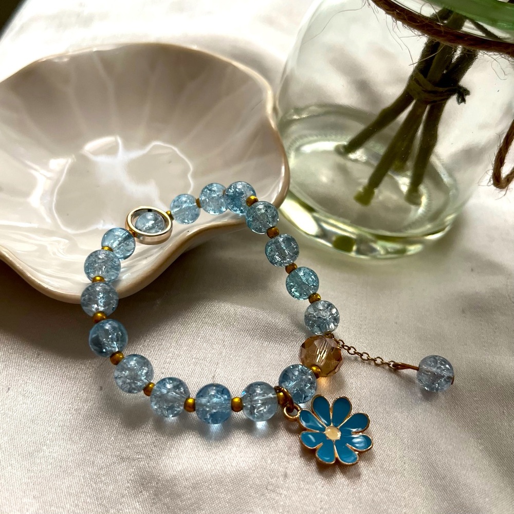 Handmade Blue Beaded Bracelet with Floral Charm